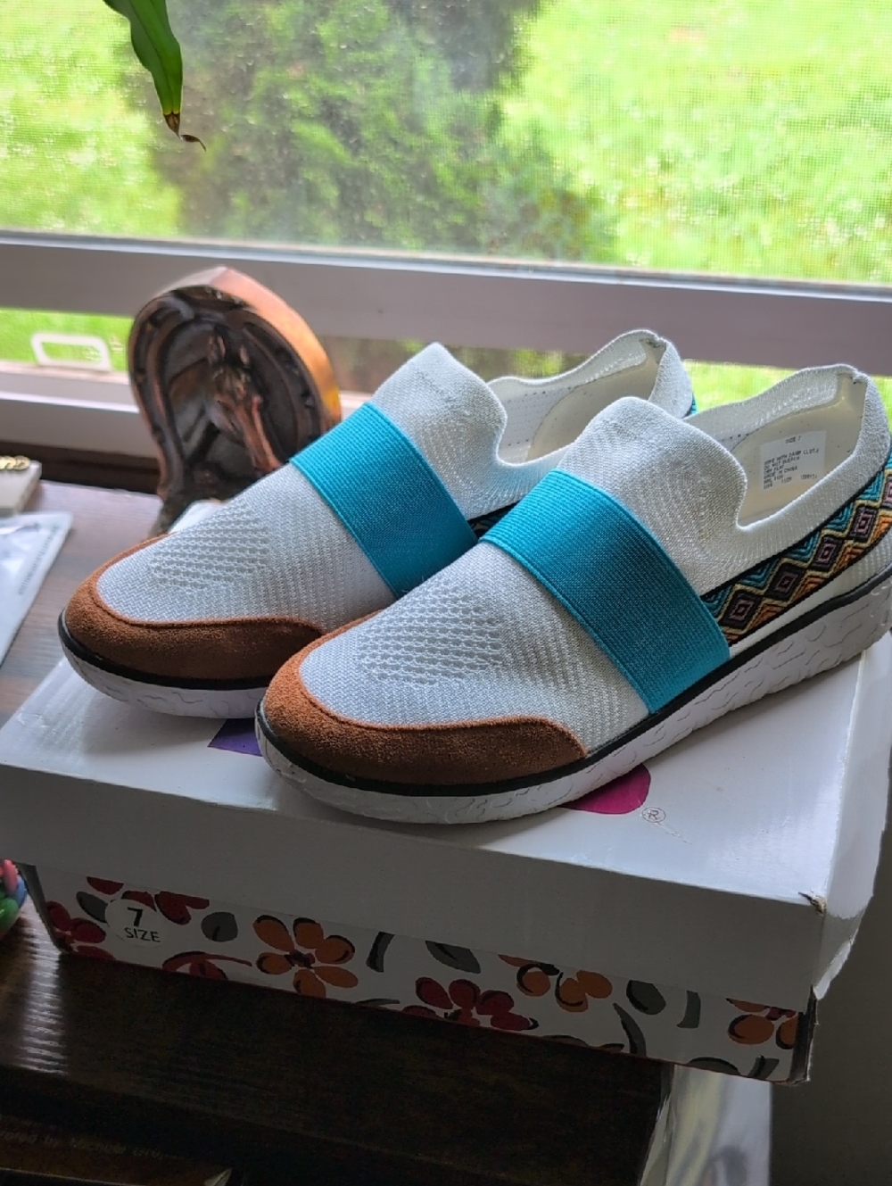 MUK lUKSWomen’s White Slip-On Knit Sneaker with Turquoise Band and Brown Accents